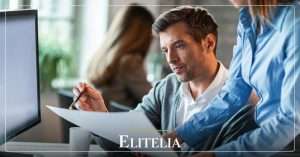 elitelia insights how to prepare a private company for sale imagen editorial Business owner and adviser preparing company sale documents